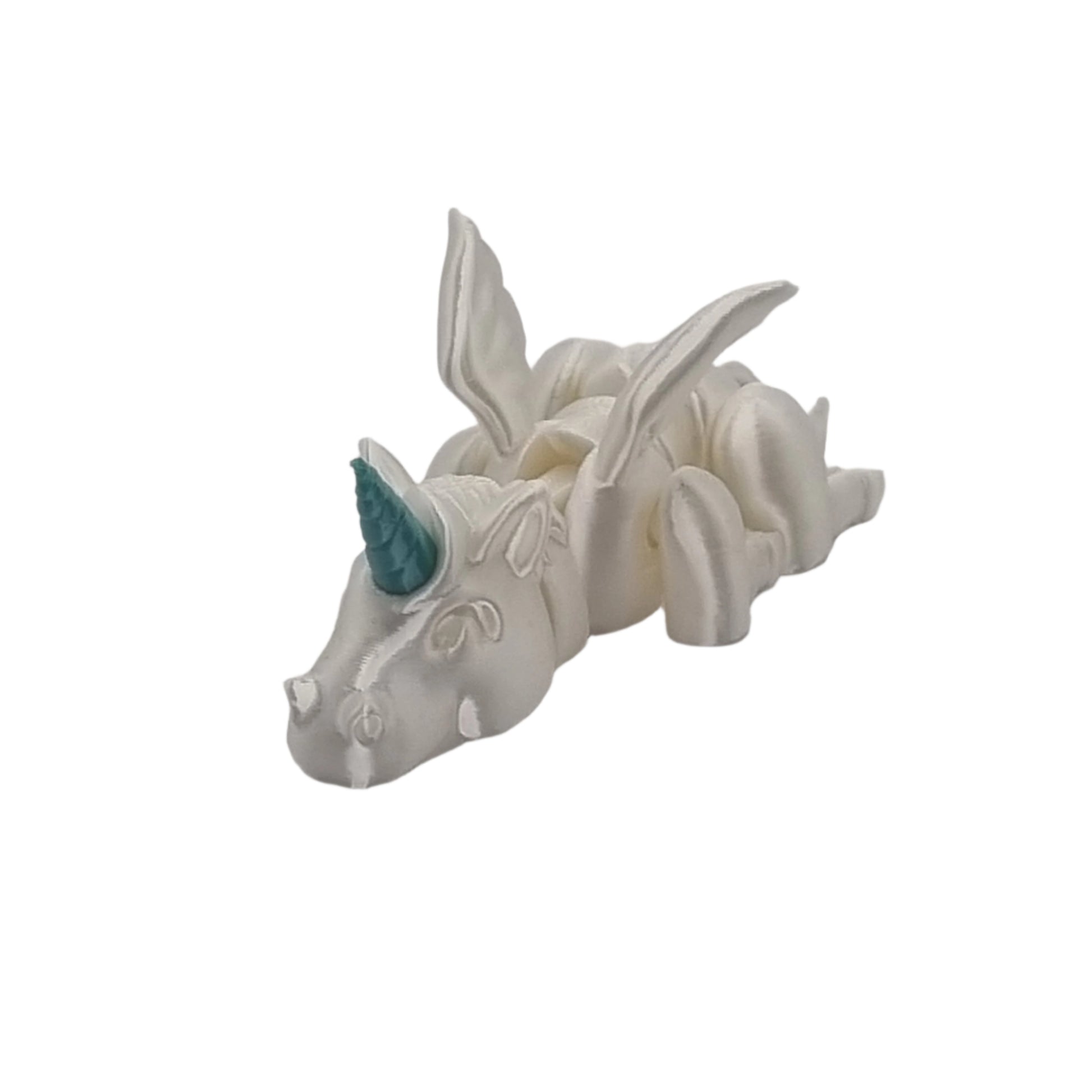Sleepy Unicorn Articulated Series front side view laid down