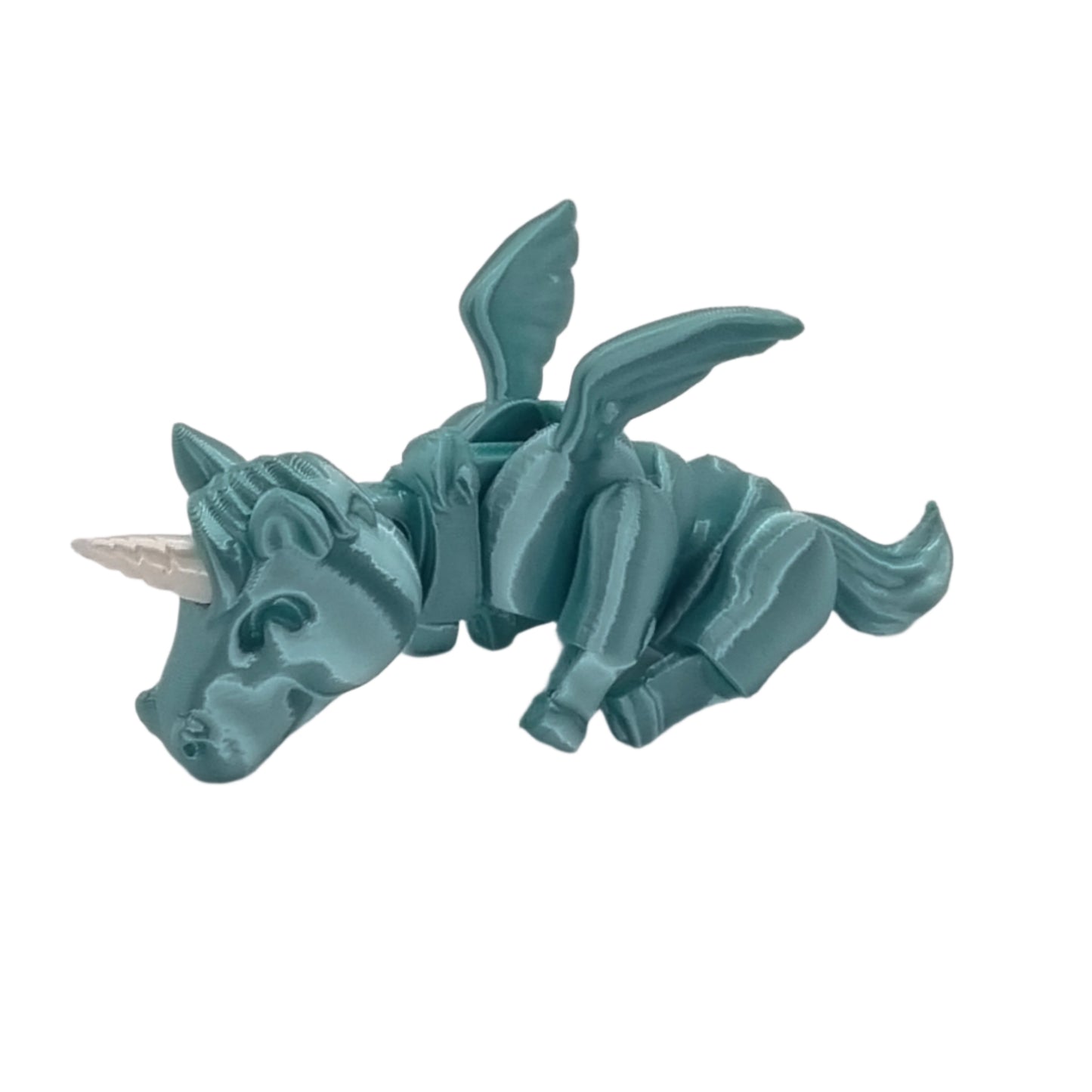 Sleepy Unicorn Articulated Series, side view, sitting down