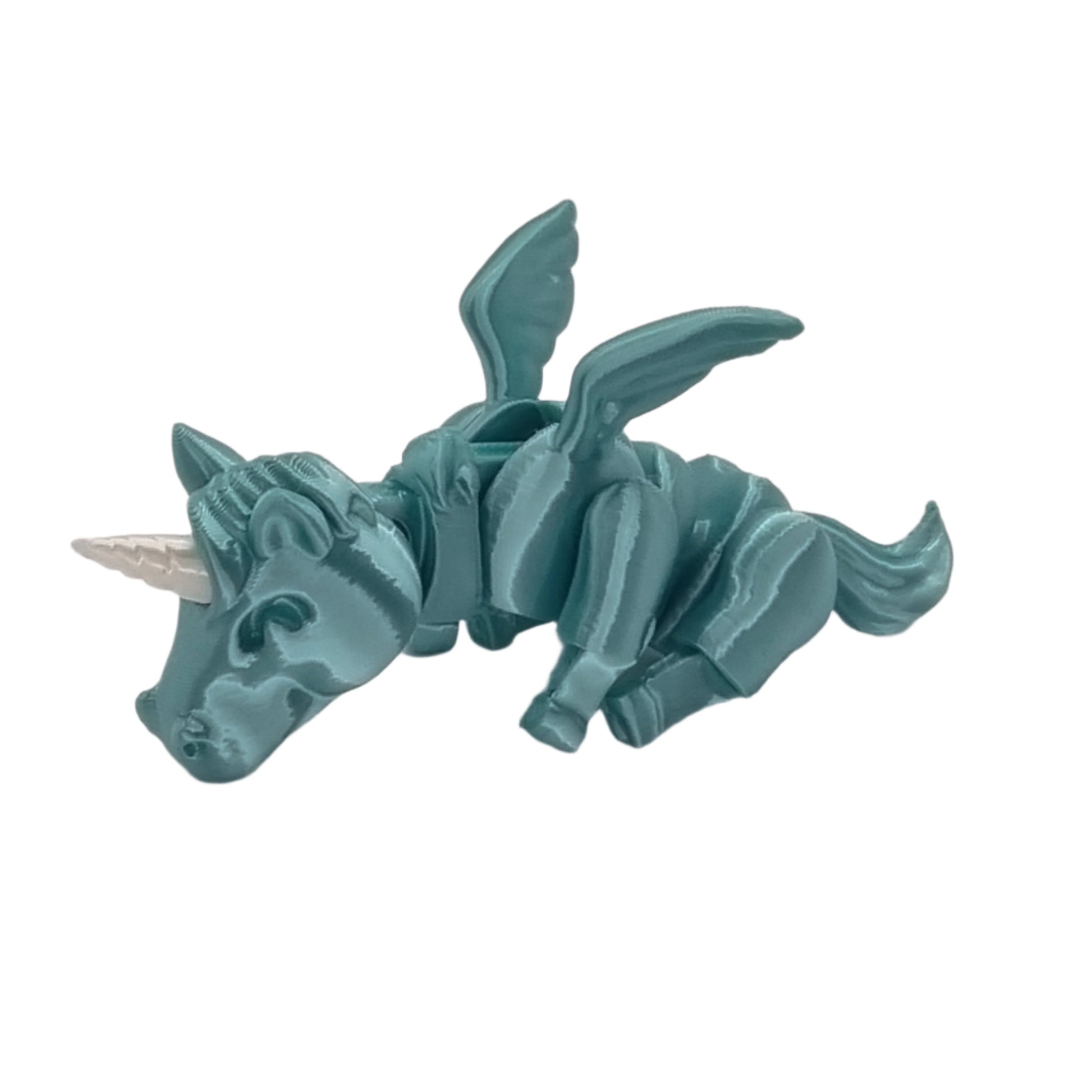 Sleepy Unicorn Articulated Series, side view, sitting down